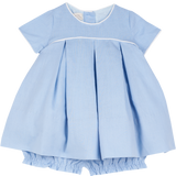 Cashmirino blue linen baby girl dress with pleated skirt, matching bloomers, short sleeves, round neck, and crochet trim
