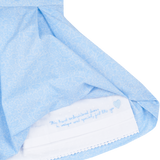 Hidden hand-embroidered message inside girls blue Liberty print dress