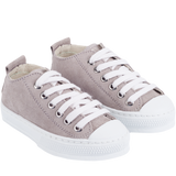 Side profile of light grey leather trainers for children.