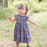 Baby Girl - Rachel Dress – Hand Embroidered Smocked 100% Cotton in Swimmer Print